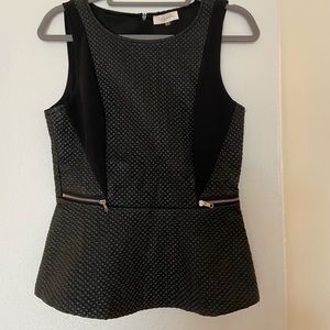 Faux leather peplum top with zipper details